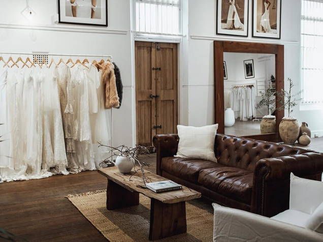 Chocolate leather couch in the Perth Grace Loves Lace bridal showroom in Western Australia