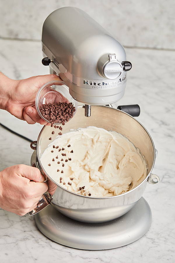 Chocolate chips added to cannoli filling