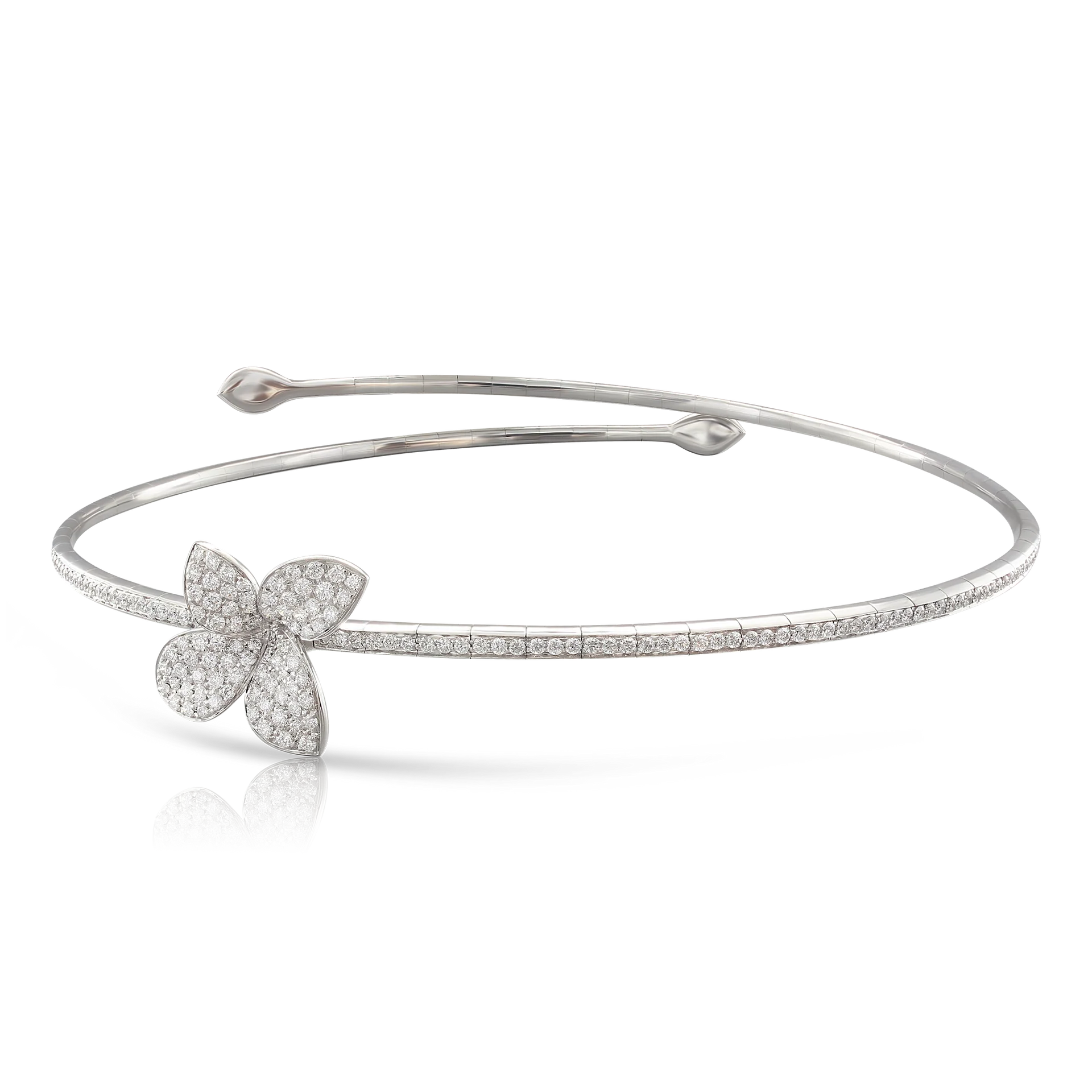 Silver bracelet with floral design and sparkling gemstones.