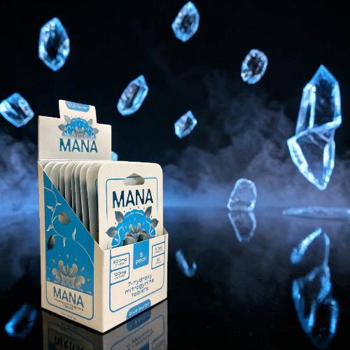 A box of Mana cards with floating blue crystals in the background.