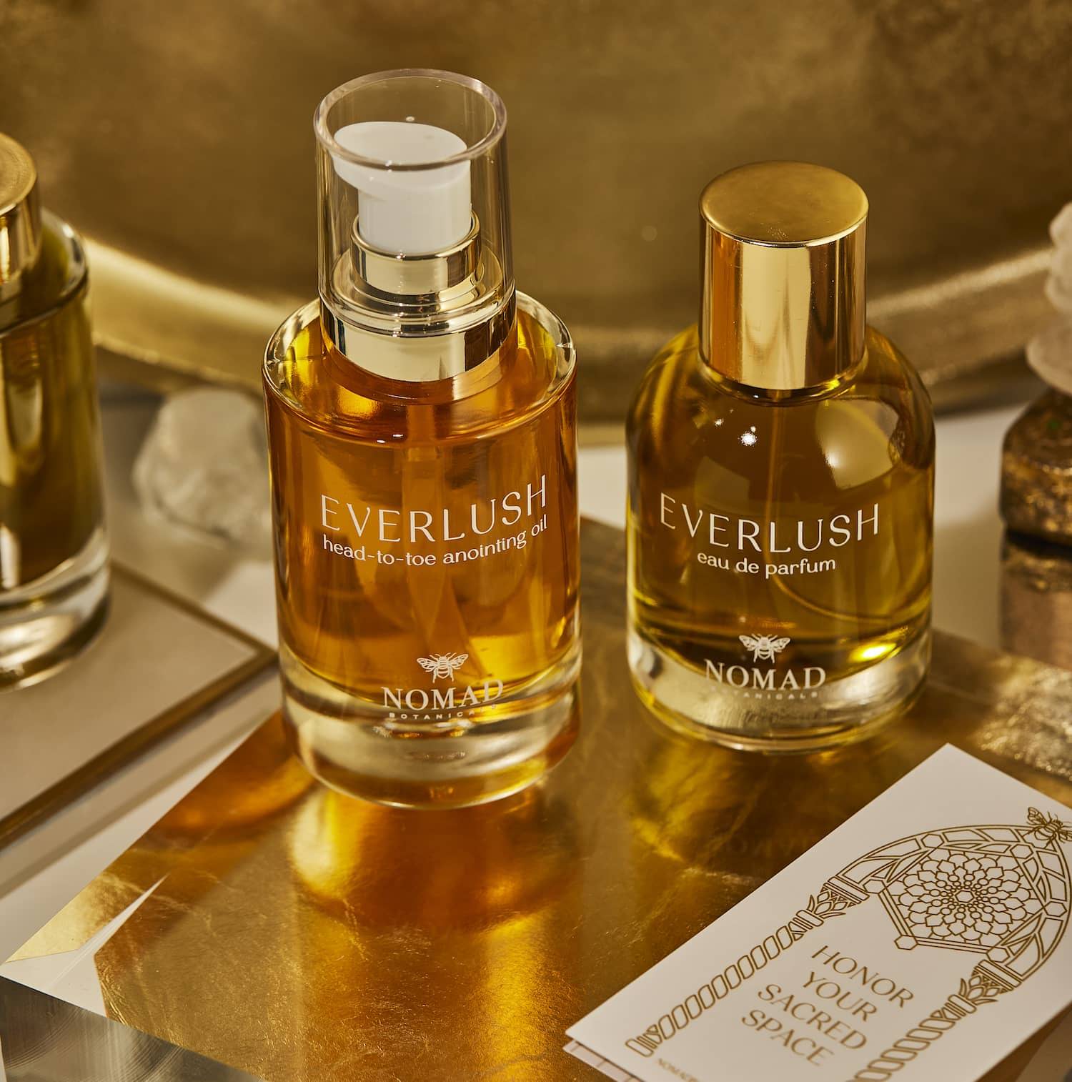 Everlush Anointing Oil and Eau de Parfum on a vanity