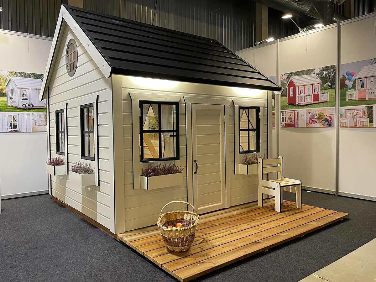 Wooden Playhouse with White Walls, Black Roof and Flower boxes  by WholeWoodPlayhouses