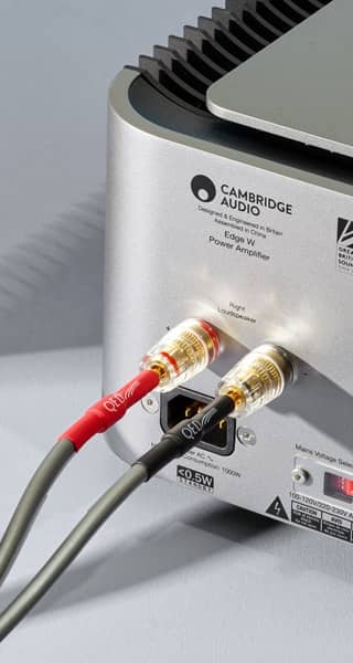Cambridge Audio device with audio cables connected at the back.