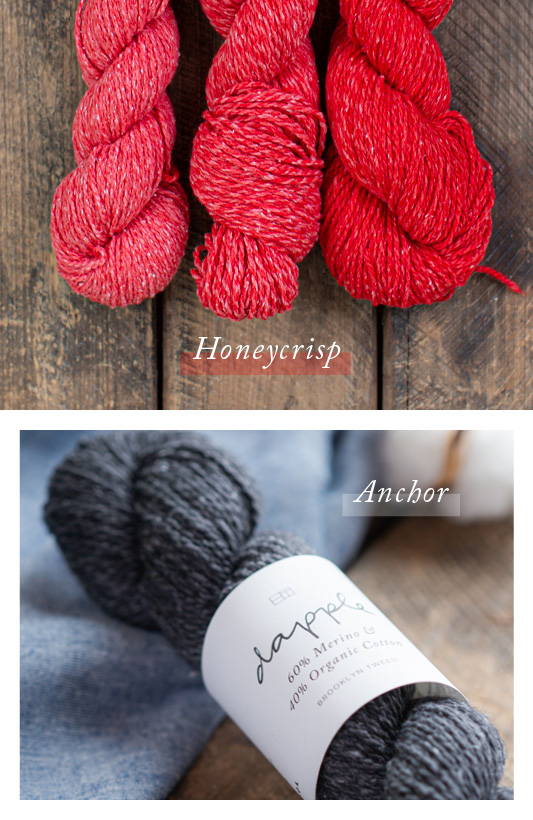 Top: Three skeins of Dapple yarn in color Honeycrisp in varying tones arranged in a row atop a wooden box. Bottom: A single skein of Dapple yarn in color Anchor with it’s label lying at an angle on top of blue linen fabric.