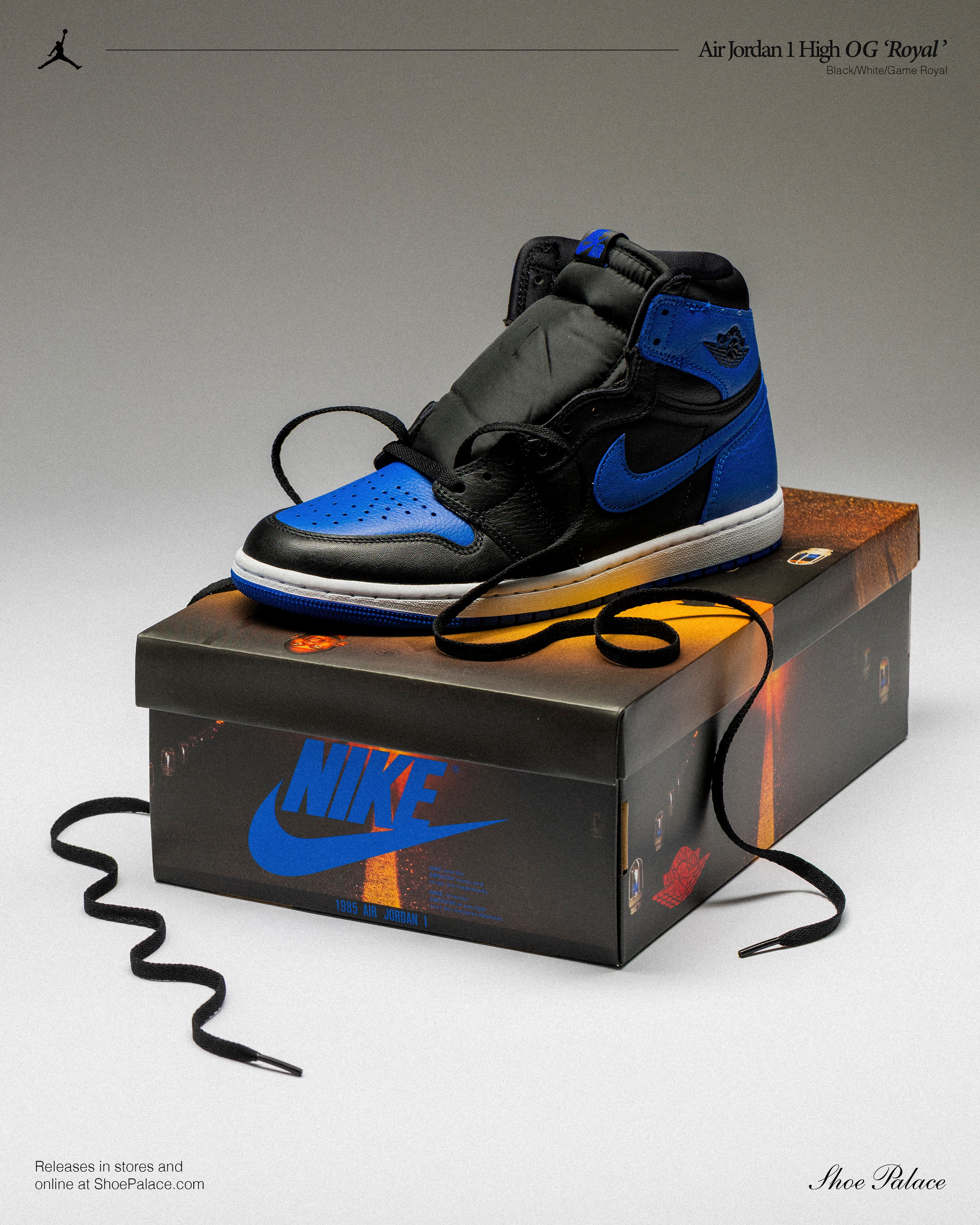 A blue and black high-top sneaker on a Nike box.