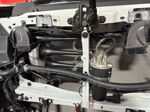 Engine bay four black train horns in front of radiator compressor clear air lines DENSO OEM horns Jay's 2024 Tundra 228H gallery photo 5