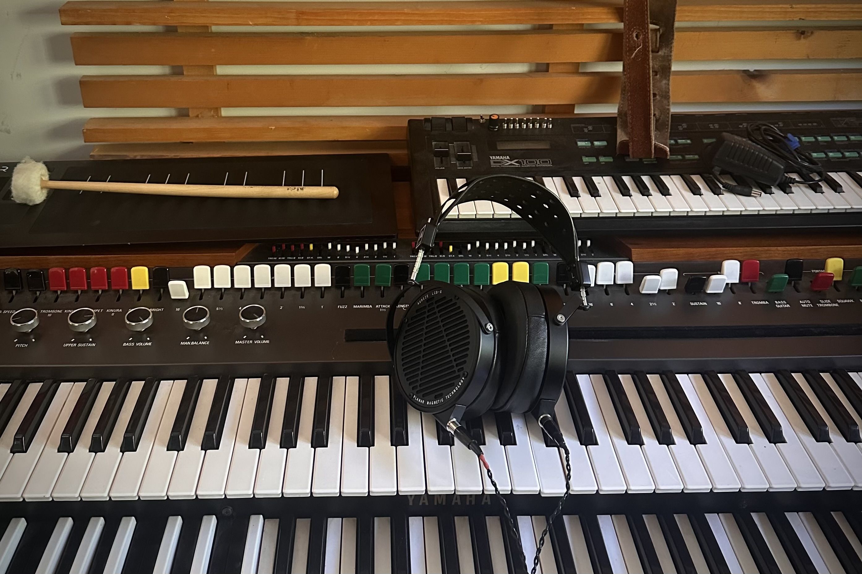 Audeze LCD-X headphones on a keyboard in the studio