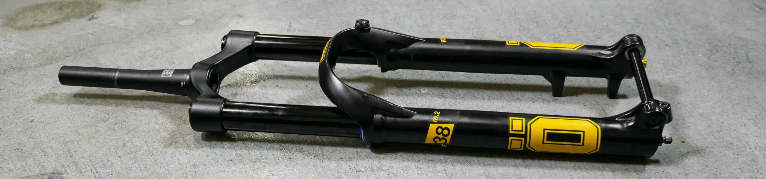 ohlins RXF38 Fork laying on concrete floor