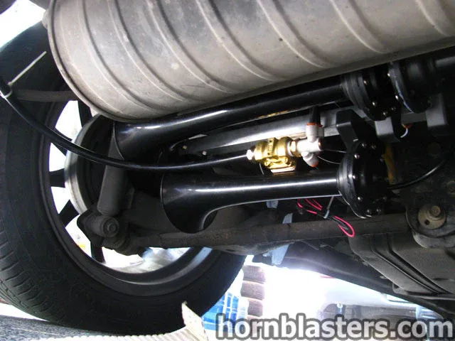 Train horns tucked under exhaust pipe rear suspension Raymond's 2004 Toyota RAV4 Conductor's Special 844K Nightmare Edition gallery photo 5