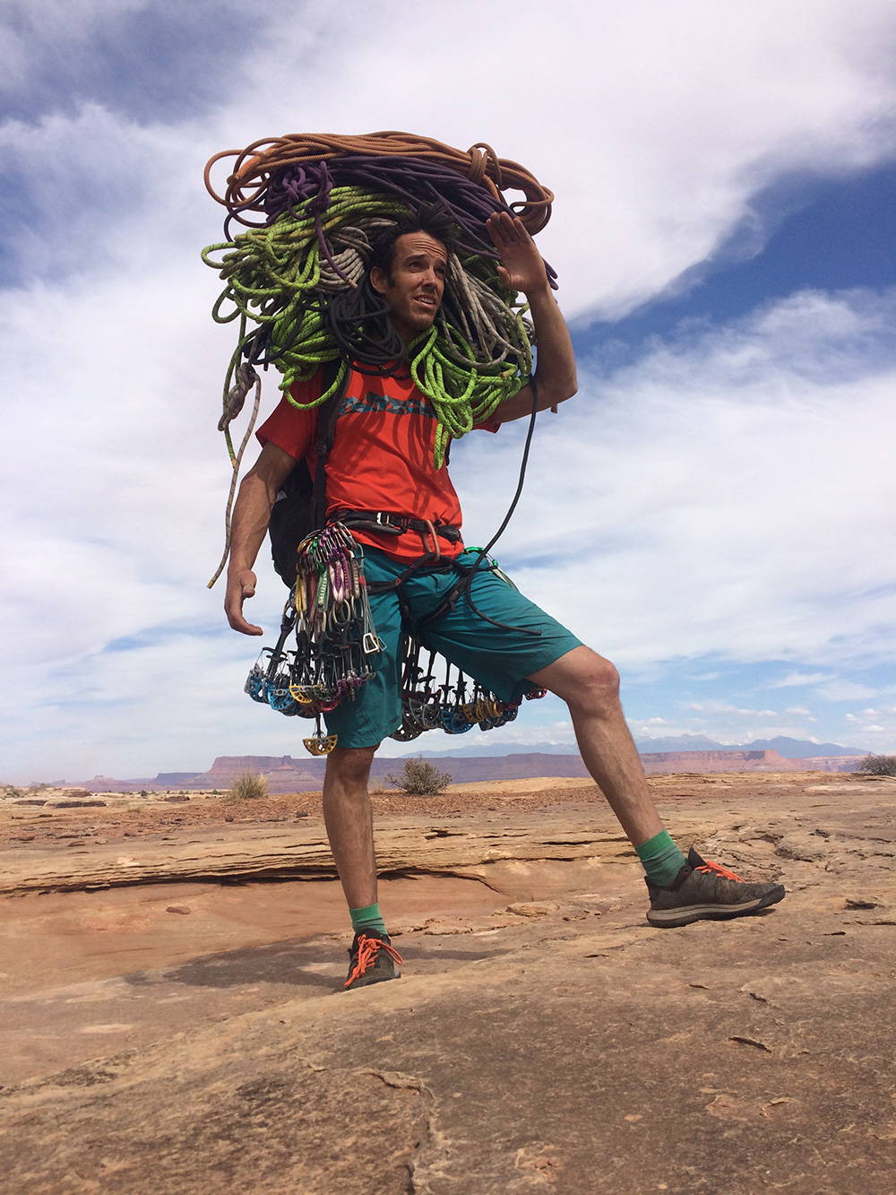 Climber loaded with gear