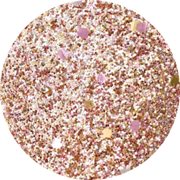 A circular surface covered in pink, gold, and white glitter.