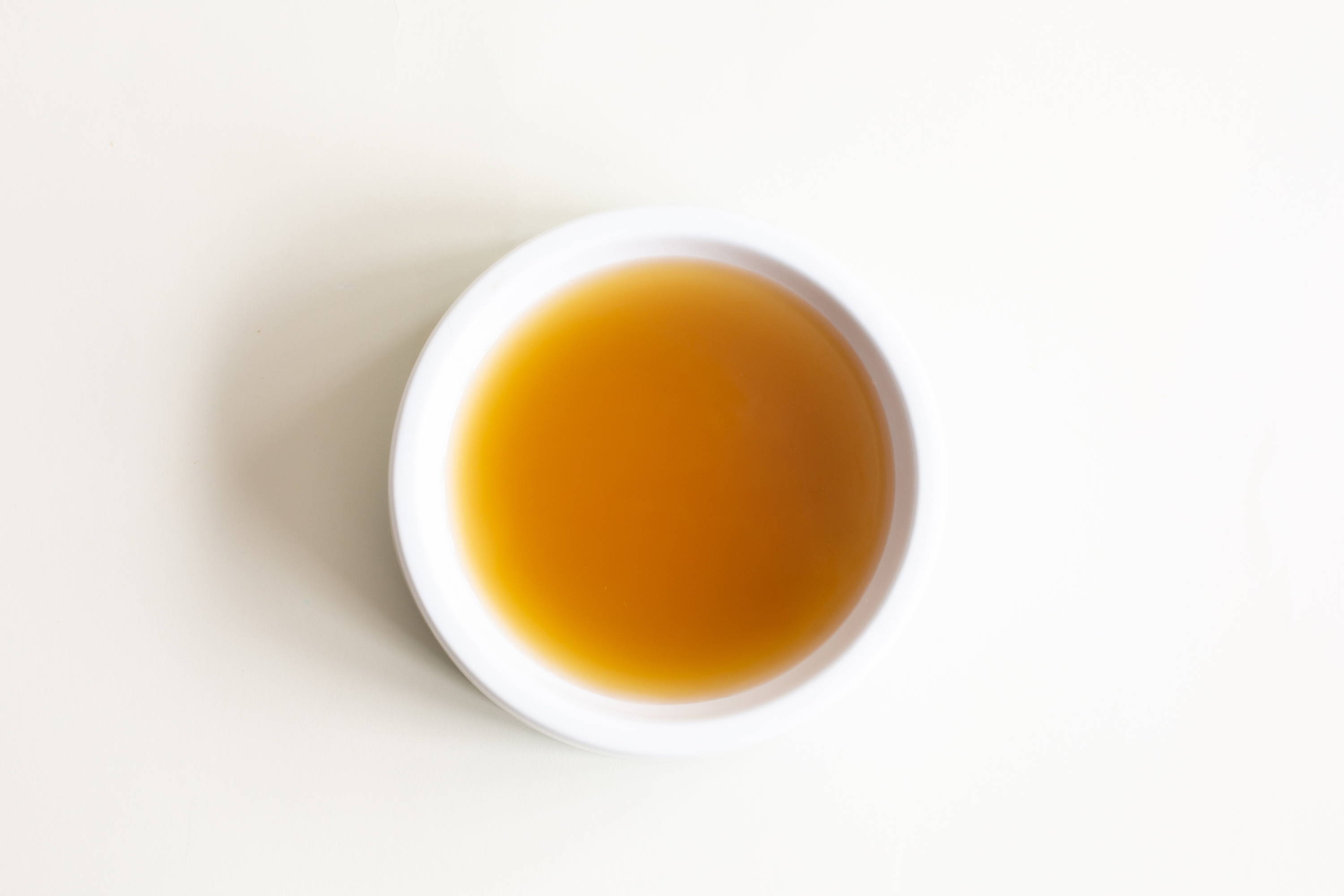 an image of a white bowl full of bone broth which is a hydrator
