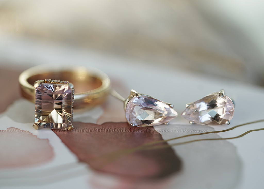 an ametrine gold ring with diamonds and pear shaped morganite earrings