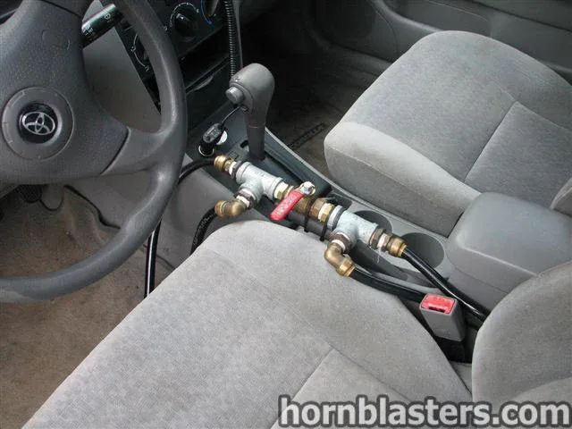 Manual ball valve center console plumbing zip-tied hoses 2001 Toyota Corolla Nathan AirChime K5LA gallery photo 13