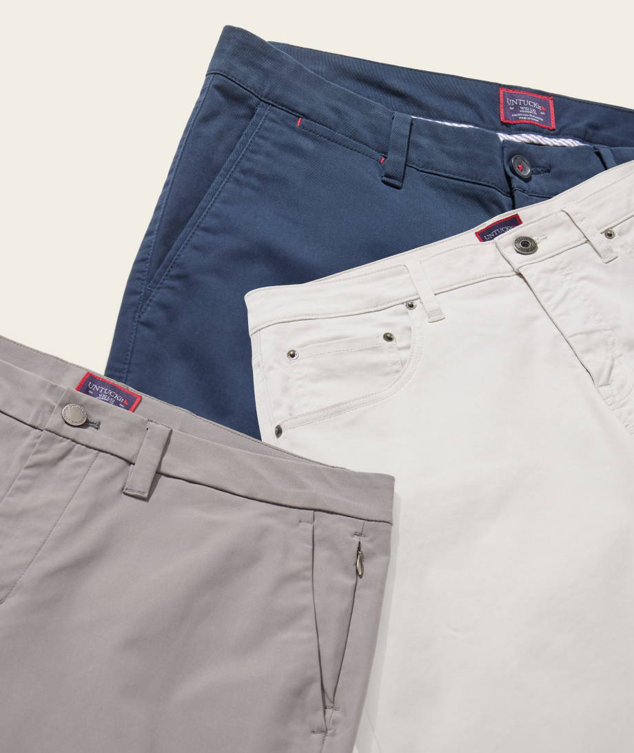 Collection of UNTUCKit bottoms.