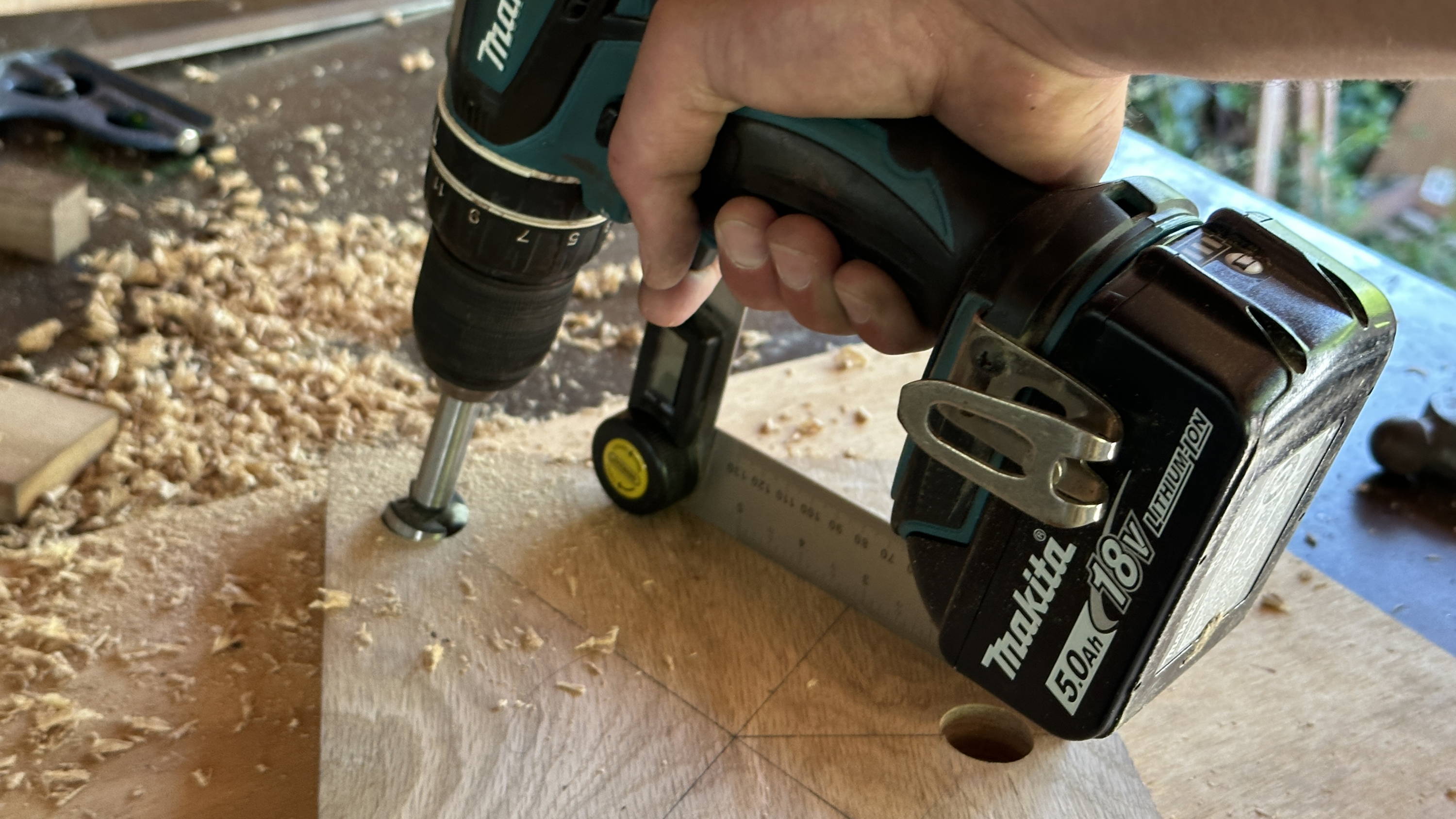 drilling round mortises in a stool seat