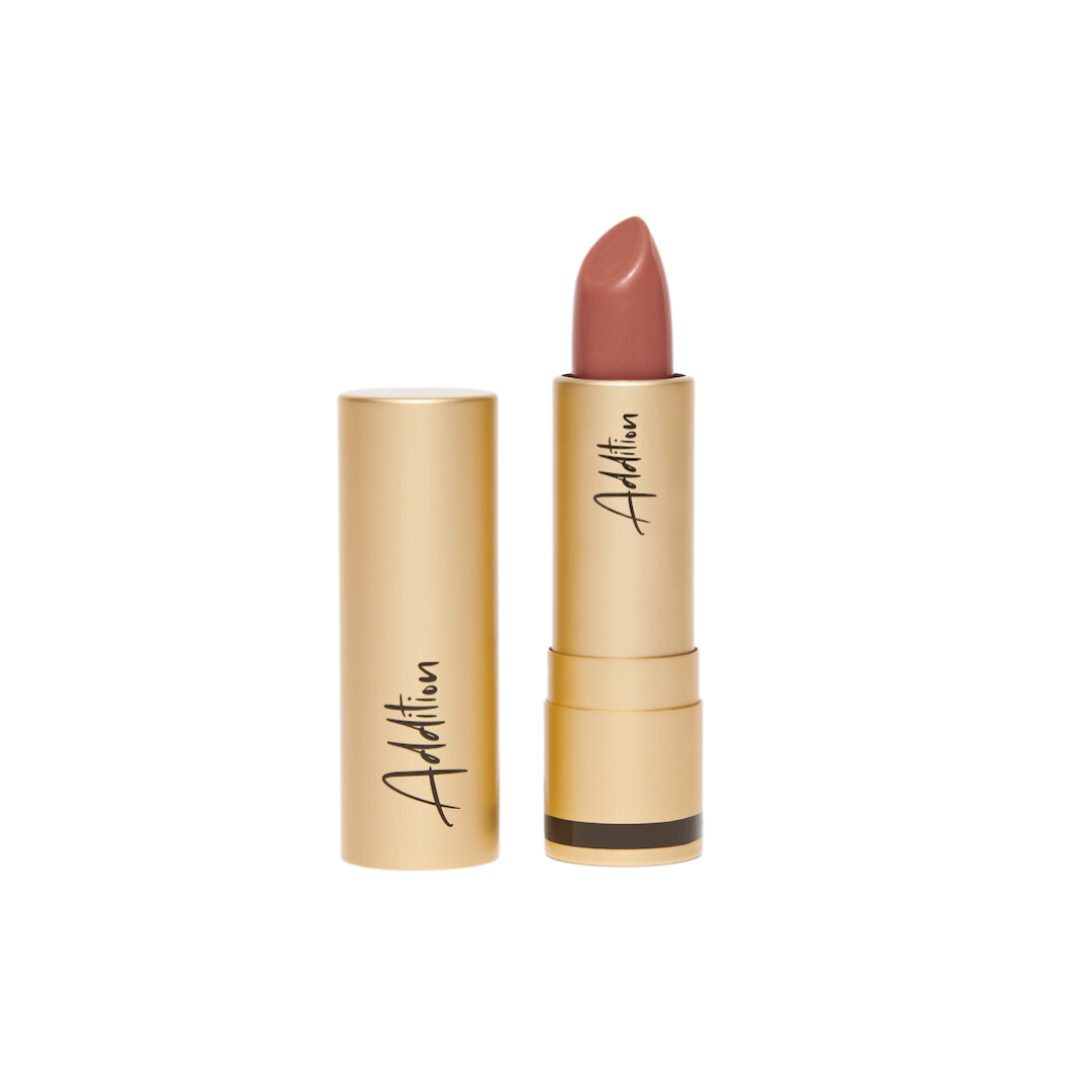 A peachy brown lipstick in a gold case from Additiona Beauty