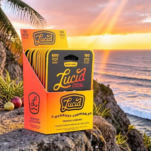 Lucía brand packaging with sunset and ocean backdrop.