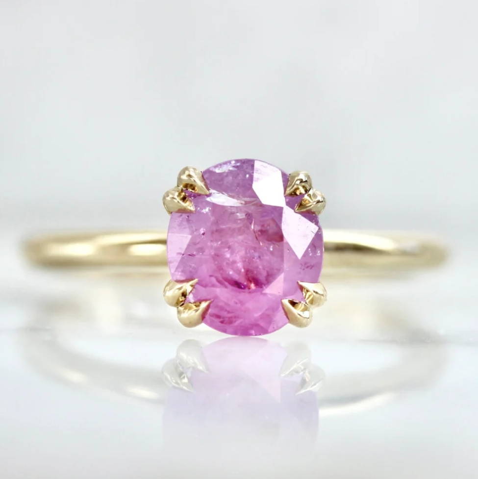 pink smoke oval cut opalescent sapphire ring