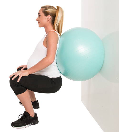 Low squat birthing ball exercise