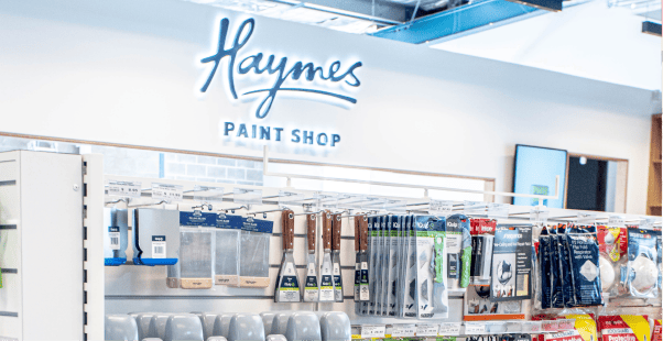 Haymes Paint Shop display with various painting supplies and tools.