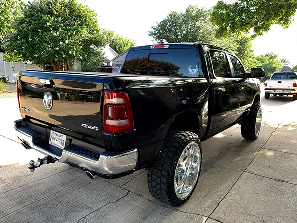 Spare tire delete horn hardware detail on Angel's Ram 1500