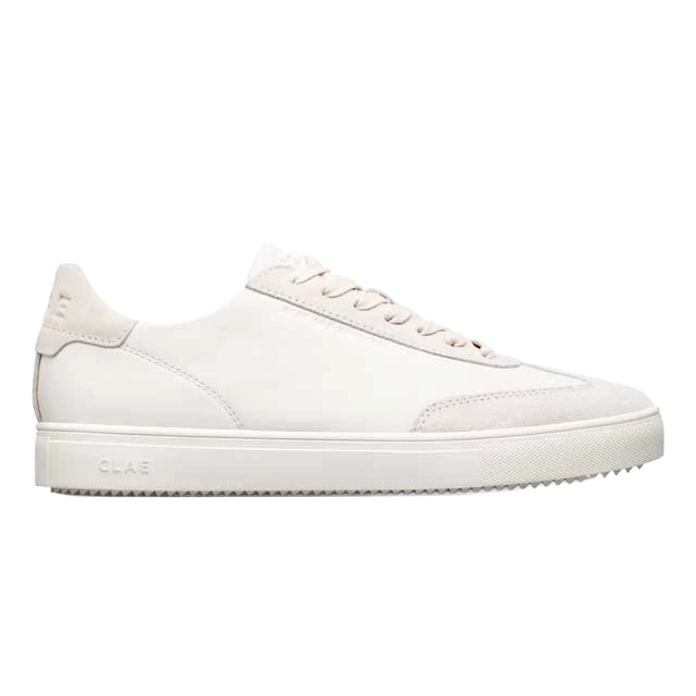 White sneaker with lace-up design and textured accents.