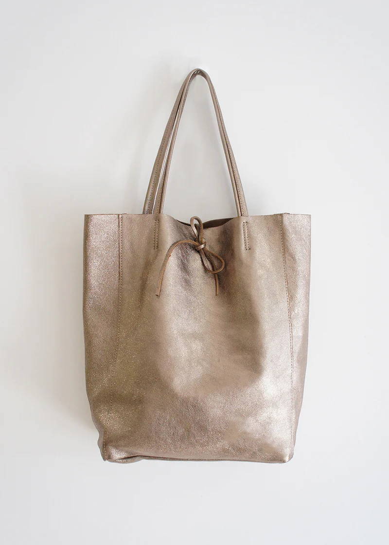 A gold leather tote bag