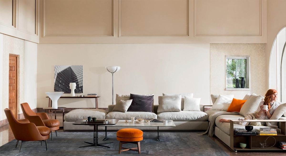 Modern Flexform living room with Groundpiece sofa, chairs, and decorative elements.
