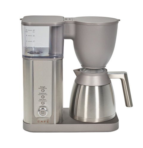 Coffee maker with stainless steel carafe and water reservoir.