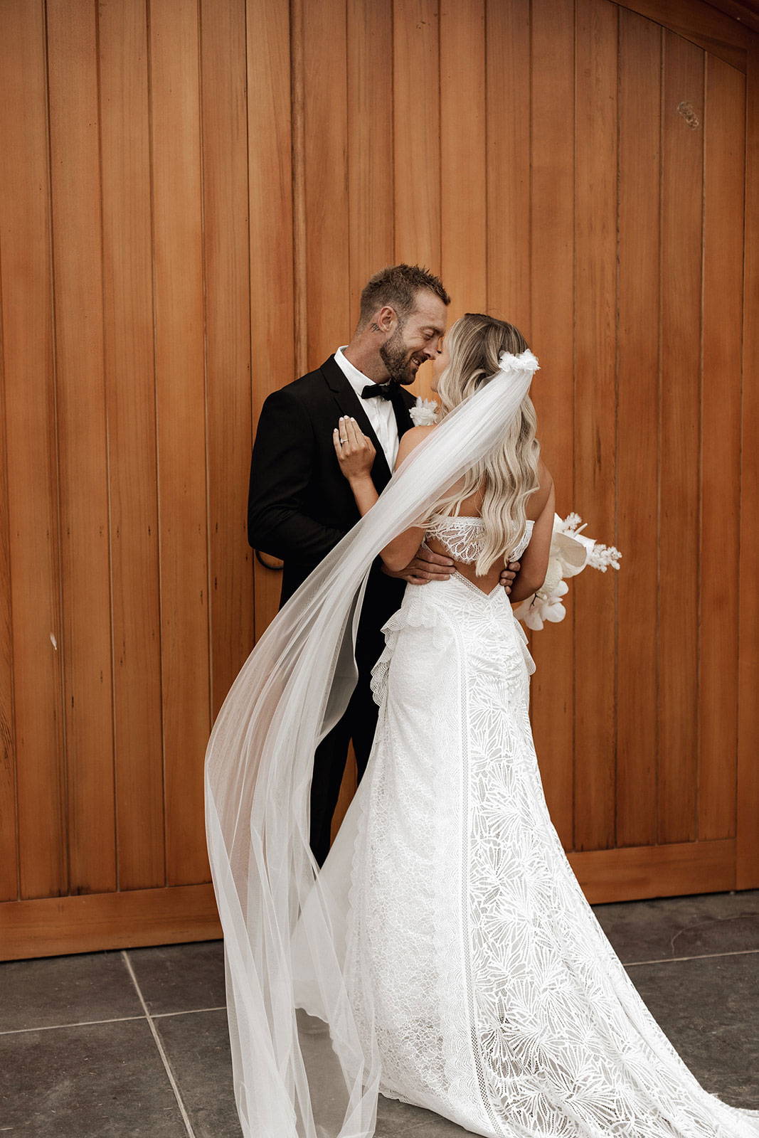 Bride wearing the Monet Veil and Noah gown