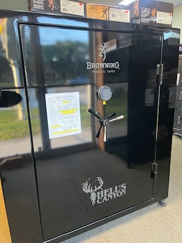 BROWNING HELL'S CANTON 65 BROWNING GRAND 33 gun safe exterior with sale price tag on door - SES spring cleaning sale