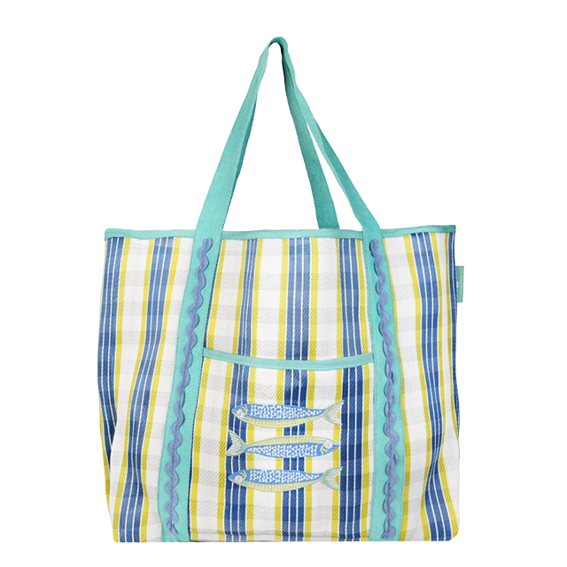 Striped tote bag with turquoise handles and decorative pocket.