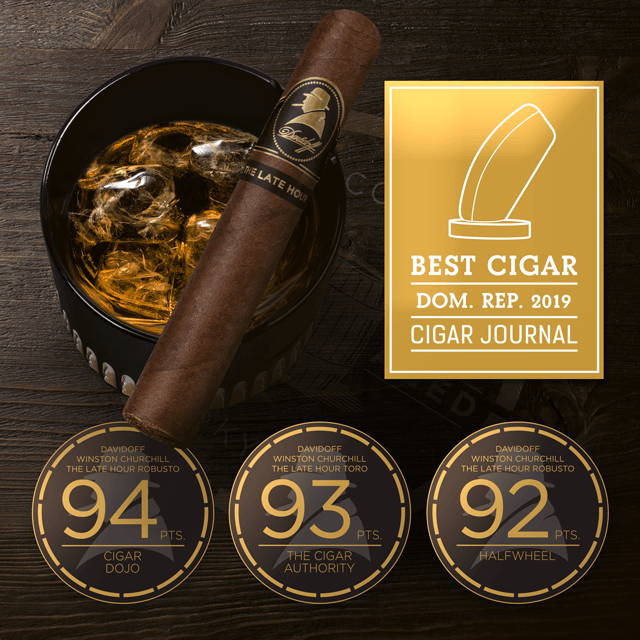 Davidoff Winston Churchill The Late Hour Series cigar lying on filled glass. Various awards - 94, 93 and 92 points, also Best Brand Dominican Republic 2019 in Cigar Journal.