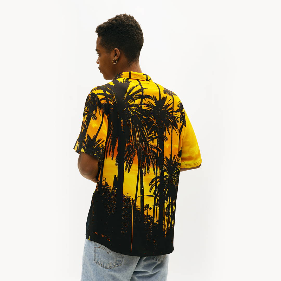 male model in boyz in the hood yellow palm trees shirt