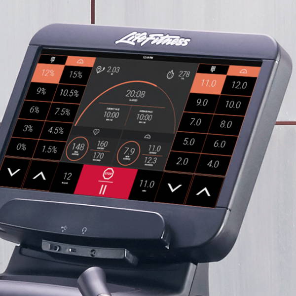 SE3 HD touchscreen console displaying workout metrics