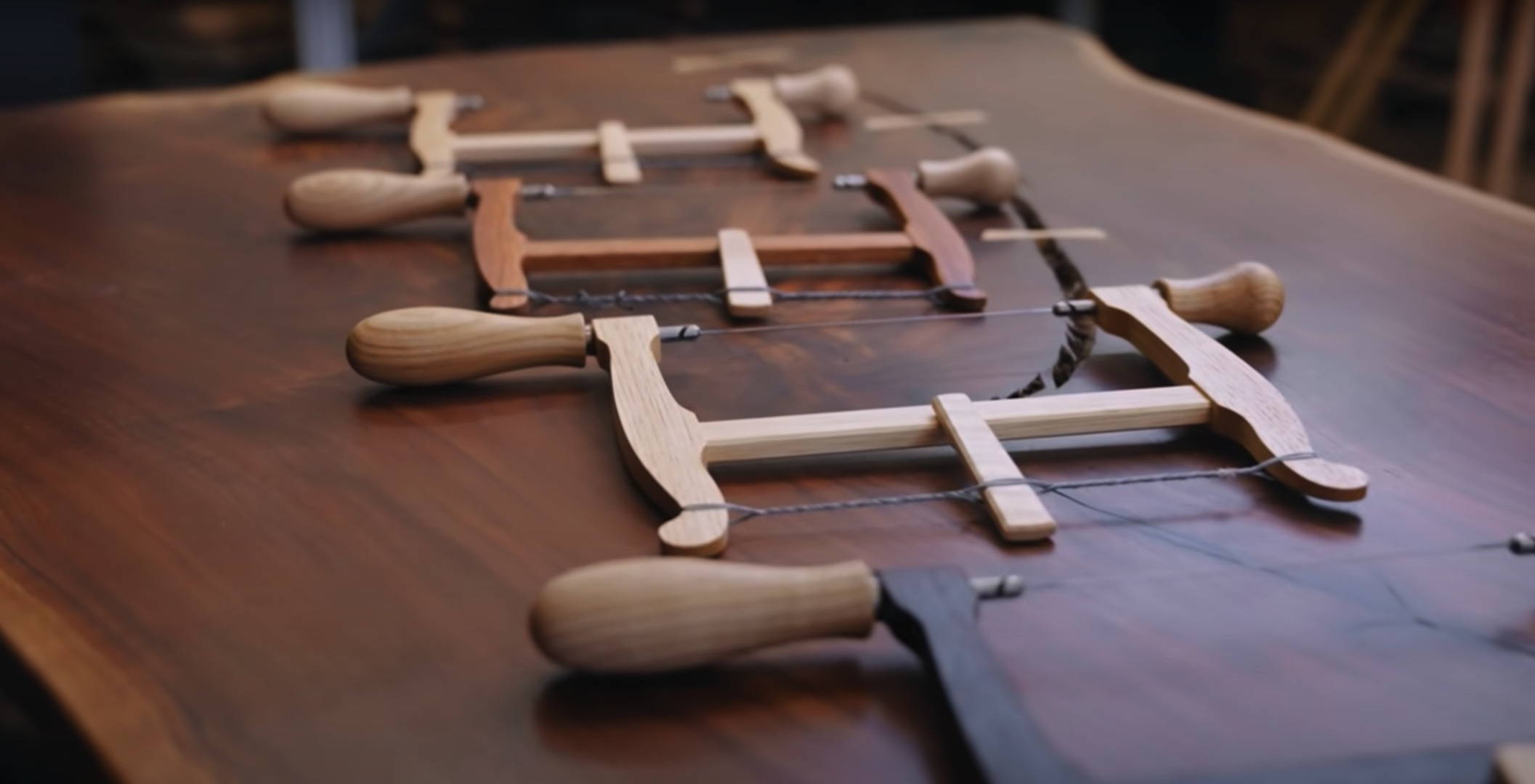 wooden coping saws on a table