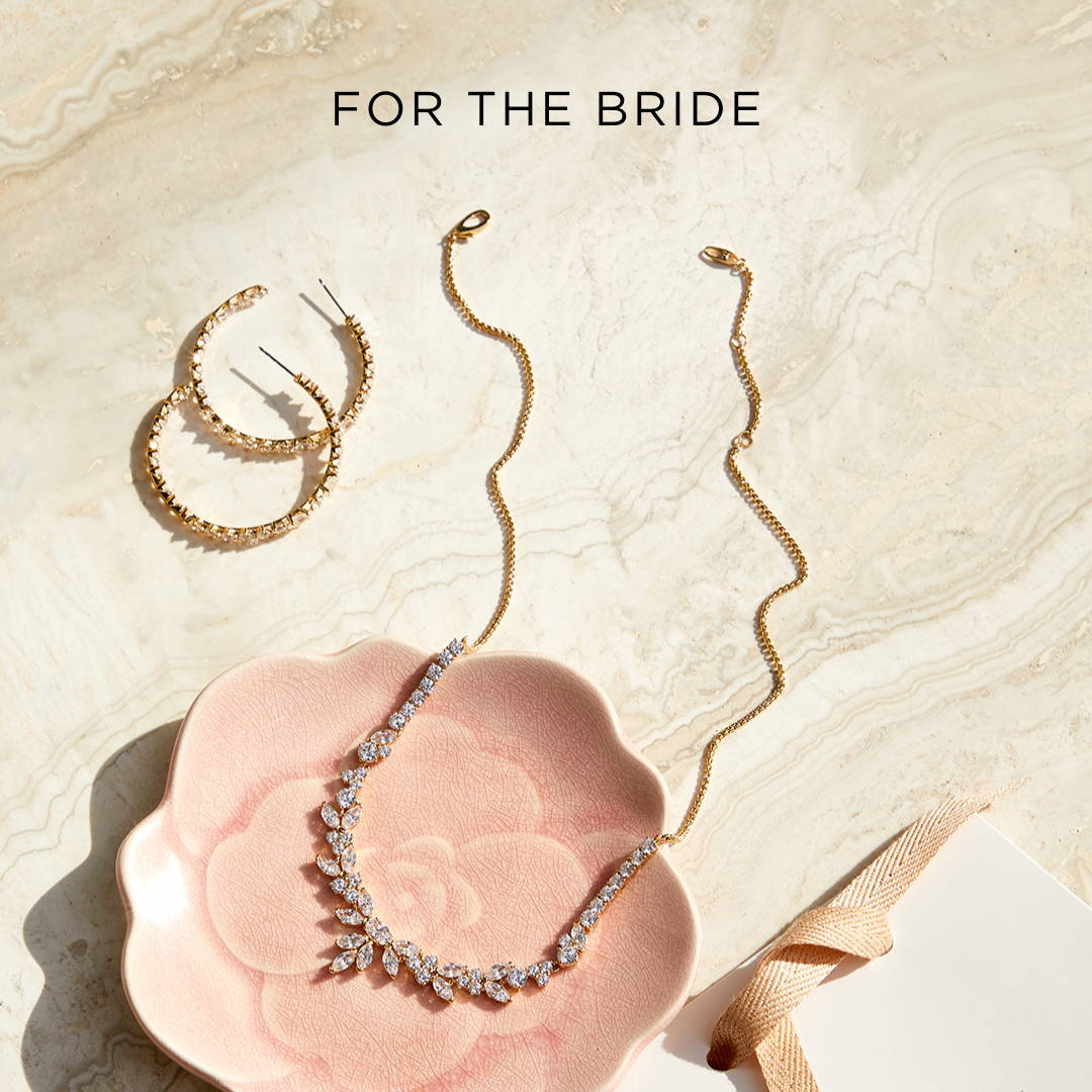 Gold hoop earrings and necklace. Click for styles for brides.