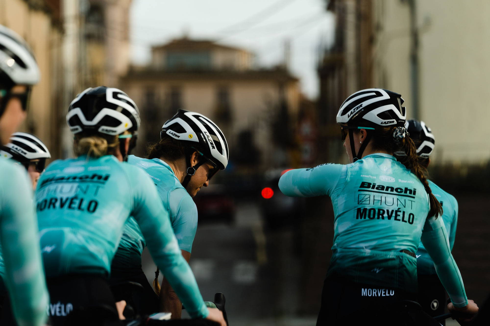 Team Bianchi HUNT Morvelo talking while riding