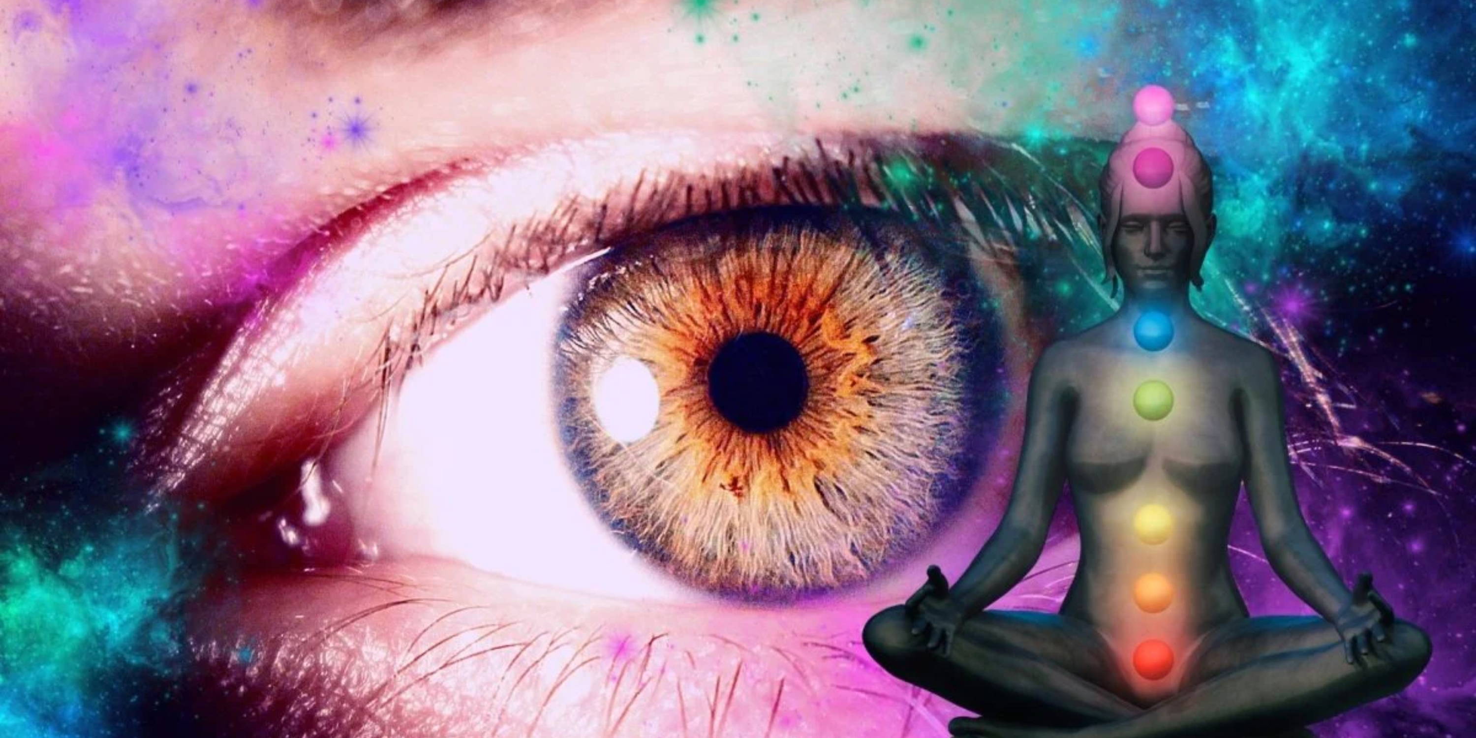 An eye covered by galaxies and a woman with chakras
