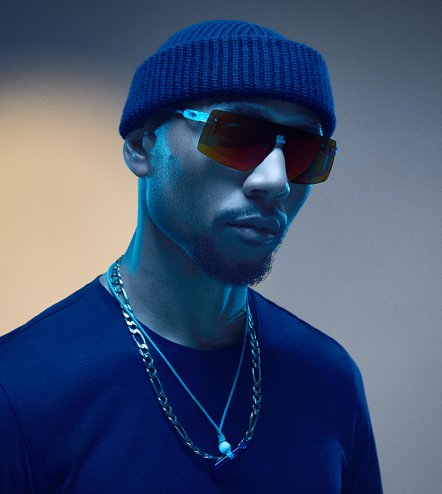 MLB Superstar Mookie Betts wearing sunglasses and a beanie, with a chain necklace.