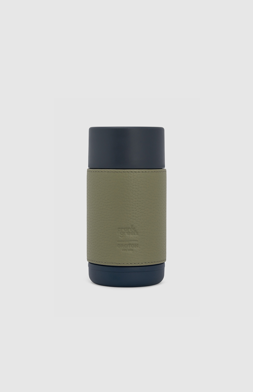 A green and dark blue insulated travel mug.