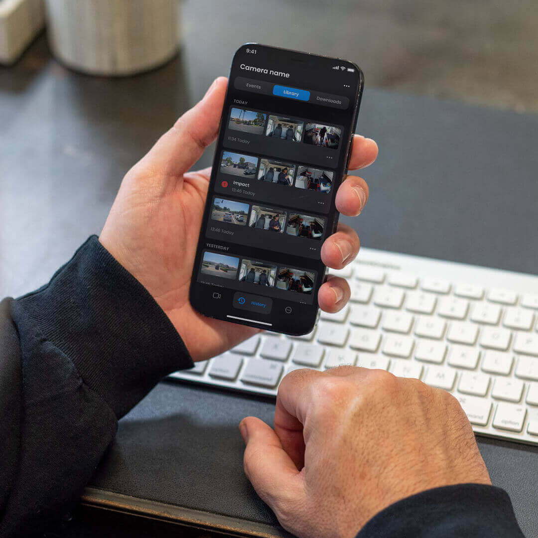 Smartphone displaying dash cam app media library.
