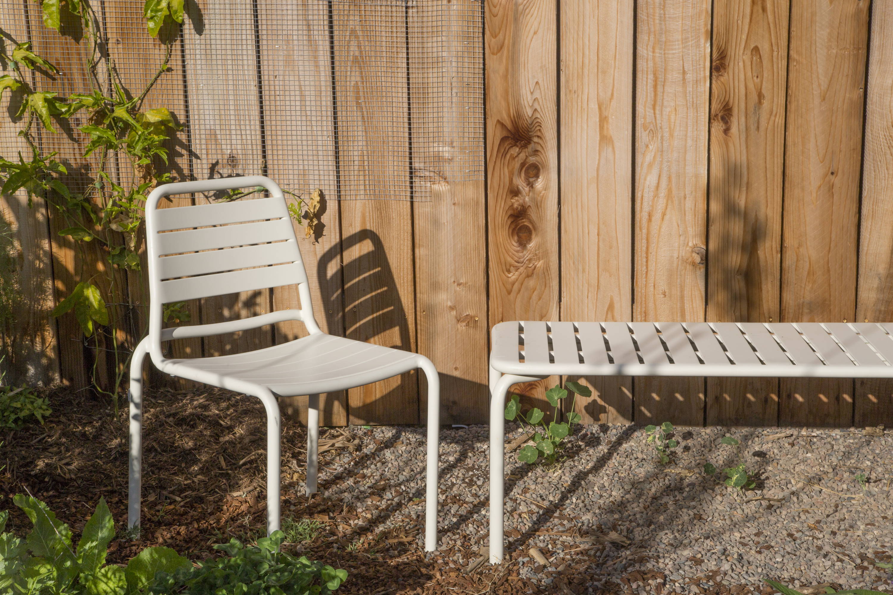 Floyd chair and bench outside in sun