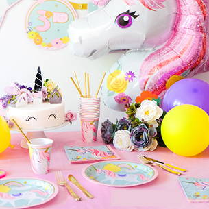 Lifestyle image of Unicorn party table setting. Shop all Birthday decorations. 
