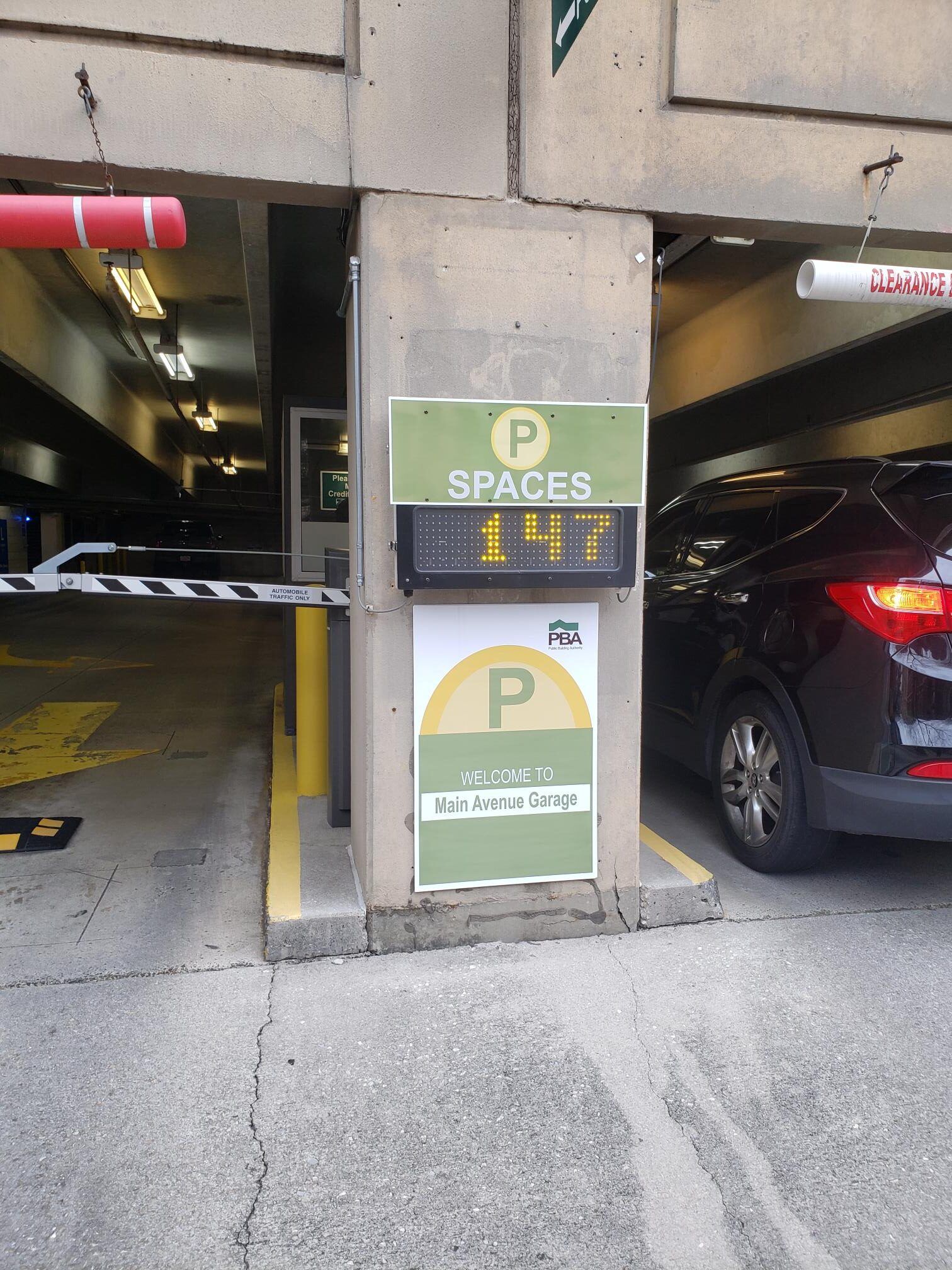 OpenSpace space-available sign showing open spaces by level at a garage entrance