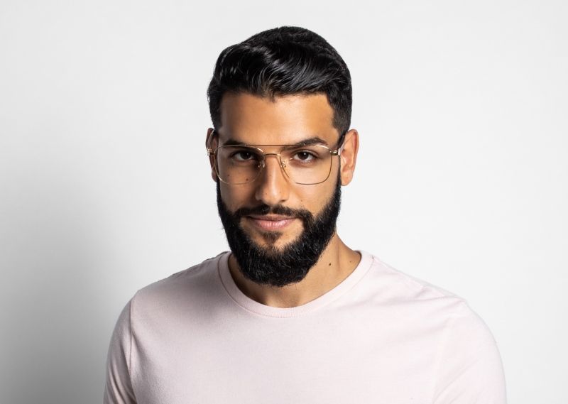 man wearing Kraywoods oblong face shape glasses collection on a white background