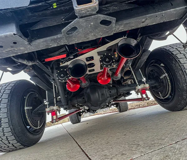 Spare tire delete bracket Shocker train horn trumpets or onboard air system on Devin's 1999 Dodge 2500 HornBlasters gallery photo 3