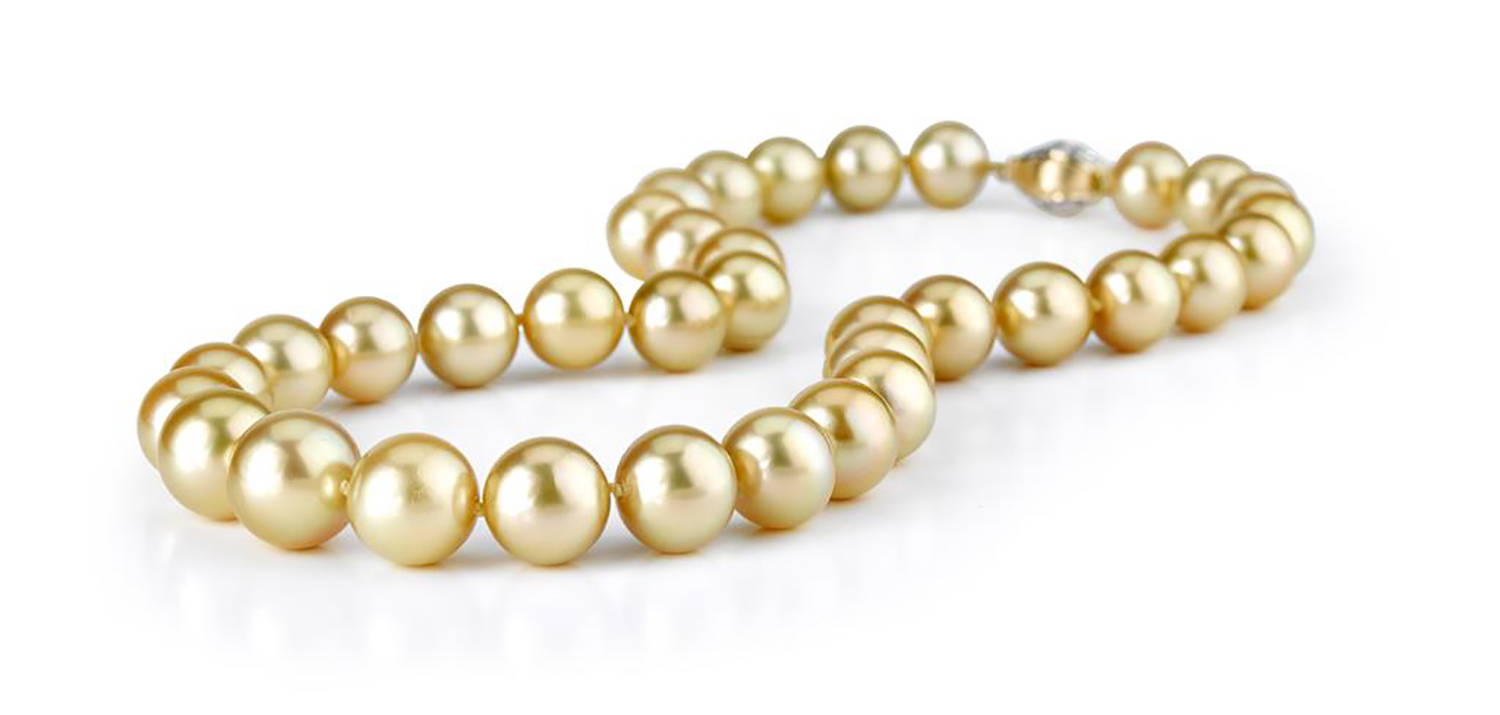 Golden South Sea pearl necklace on white background