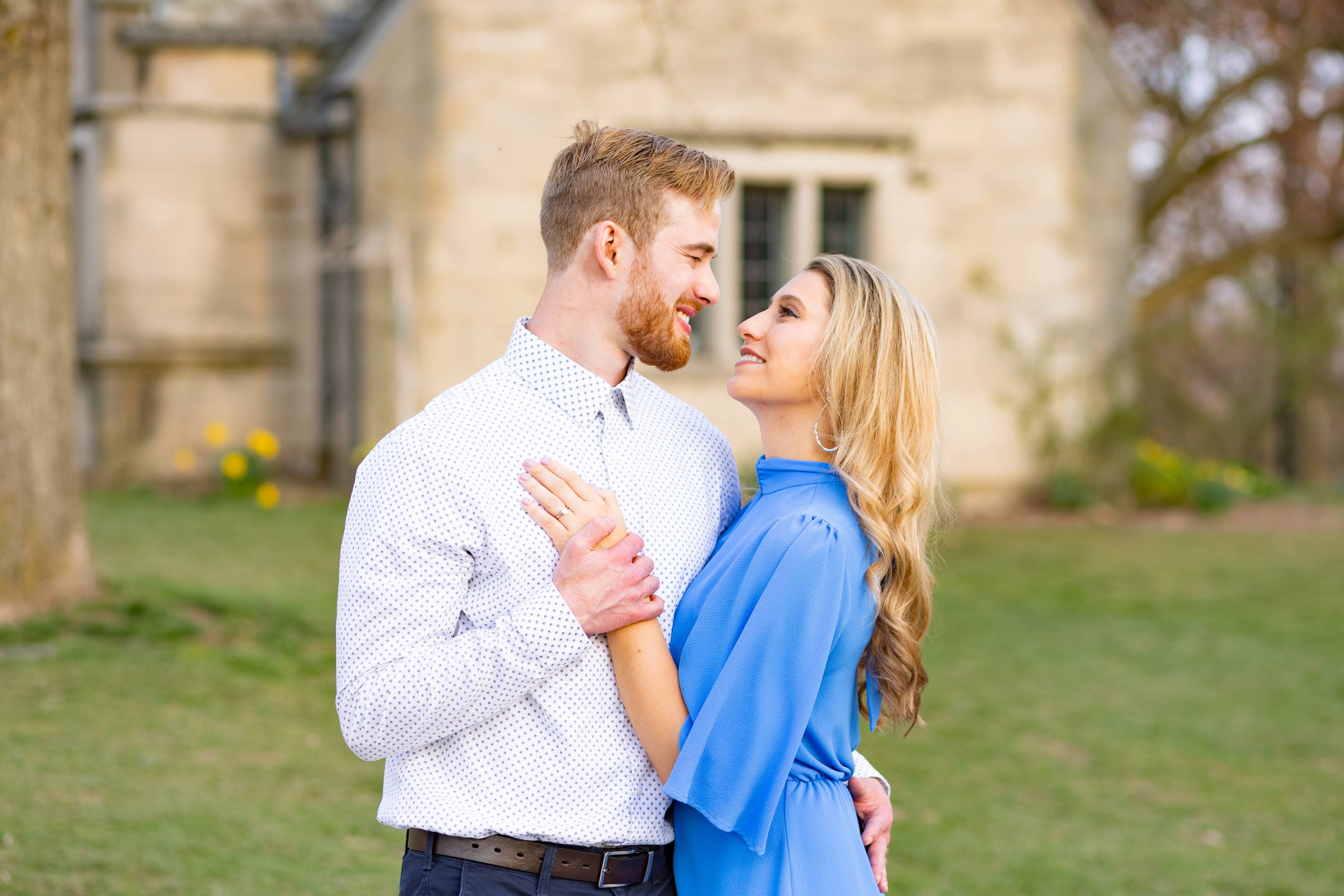 Henne Engagement Ring Couple Kyle & Alyssa Standing in Front of Antique Building